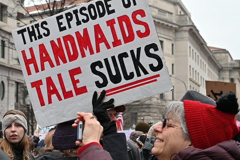 Protesters display signs on Freedom Plaza during the Women's March in Washington, D.C. on January 19, 2019.